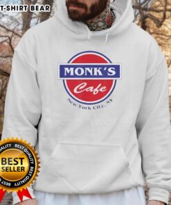 Cozy Pretty Monks Cafe in New York City, NY, featuring a stylish hoodie and inviting atmosphere.