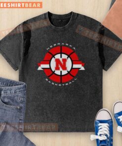 Alt Text: Pretty Nebraska Cornhuskers Basketball Classic Circle Logo on a washed t-shirt, perfect for fans and casual wear.