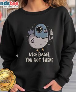 Pretty Nice Bagel You Got There sweatshirt displayed on a hanger, featuring a fun graphic and cozy design.