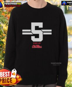 Kewan Lacy wearing a Pretty Ole Miss Rebels football 5-stripe sweatshirt, showcasing team spirit and style.