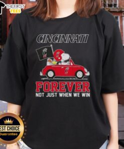 Pretty Peanuts Snoopy driving a car in a Cincinnati Bearcats Forever tee, celebrating fandom beyond just winning.