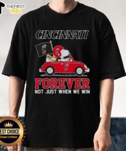 Pretty Peanuts Snoopy driving a car on a Cincinnati Bearcats Forever T-shirt, perfect for fans celebrating team spirit.