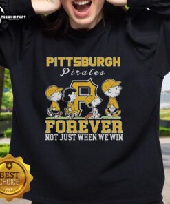 Alt Text: Cute Snoopy and Charlie Brown sweatshirt featuring Pittsburgh Pirates logo, perfect for baseball fans all year round.