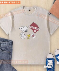 Alt Text: Pretty Snoopy and Woodstock holding Indiana Hoosiers flag on a National Champions 2025 Go Big Red washed t-shirt.