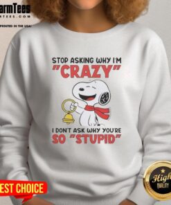 Alt Text: Pretty Snoopy holding a bell on a sweatshirt with the phrase 'Stop Asking Why I'm Crazy' in bold lettering.