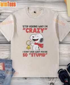 Alt Text: Pretty Snoopy holding a bell on a washed t-shirt with the phrase 'Stop asking why I'm crazy, I don't ask why you're so stupid.'