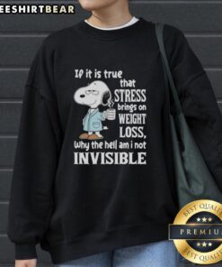 Cozy sweatshirt featuring Snoopy with a humorous quote about stress and weight loss, perfect for casual wear.