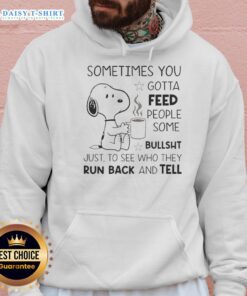 Alt Text: Pretty Snoopy hoodie with the quote about feeding people bullsht to reveal their true colors, perfect for casual wear.
