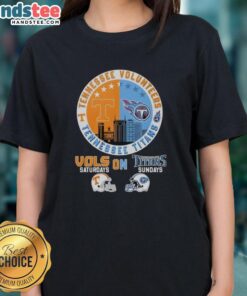 Alt Text: Pretty Tennessee Volunteers and Titans helmet logo mashup on a ladies tee for game day style.