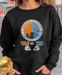 Stylish sweatshirt featuring a mashup of Tennessee Volunteers and Titans helmet logos for game day wear.