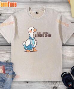 Pretty Today I Will Be A Serious Goose washed t-shirt displayed on a wooden background, showcasing its playful design.