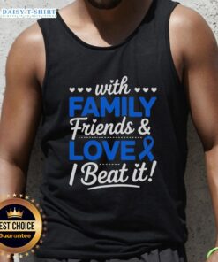 Survivor in blue ribbon tank top celebrating with family and friends after beating colon cancer.