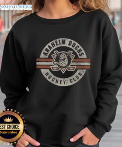 Alt Text: Cozy Top Anaheim Ducks Surround Sweatshirt with team logo, perfect for fans supporting the Ducks during game day.