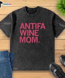 Top Antifa Wine Mom washed T-shirt featuring bold graphics and a comfortable fit for stylish activism and casual wear.
