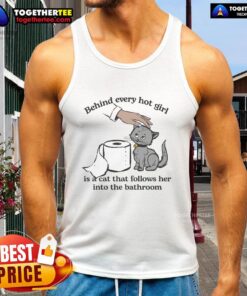 Hot girl in tank top with a cat following her into the bathroom, showcasing the bond between pets and their owners.