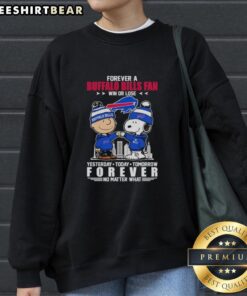 Charlie Brown fist bumping Snoopy in Buffalo Bills sweatshirt, celebrating loyalty win or lose, perfect for fans.