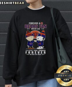 Charlie Brown fist bumping Snoopy in a Chicago Bears sweatshirt, celebrating loyalty win or lose, perfect fan apparel.