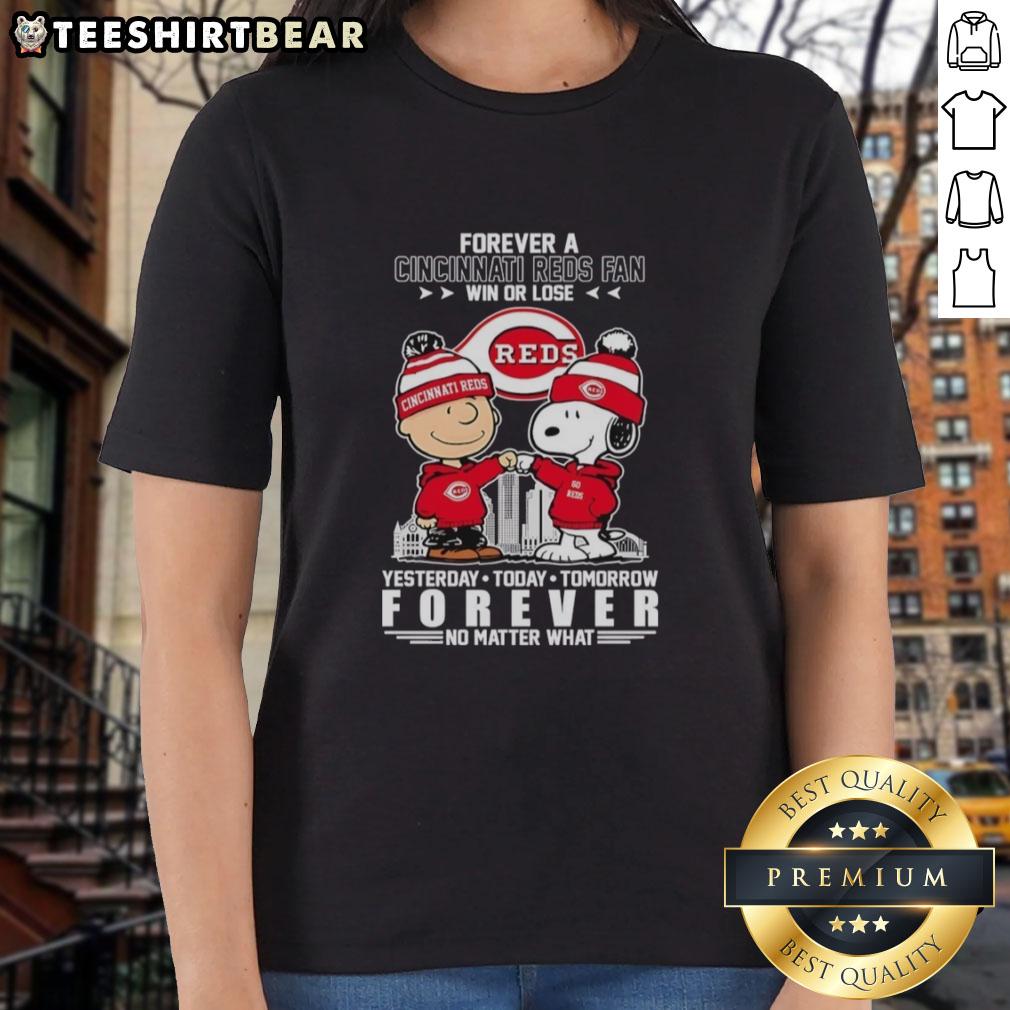 top-charlie-brown-fist-bump-snoopy-forever-a-cincinnati-reds-fan-win-or-lose-no-matter-what-ladies-tee Alt Text: Top Charlie Brown fist bump with Snoopy in Cincinnati Reds fan tee, celebrating loyalty win or lose.