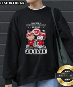 Top Charlie Brown fist bump with Snoopy, celebrating Cincinnati Reds fandom in a win or lose sweatshirt design.