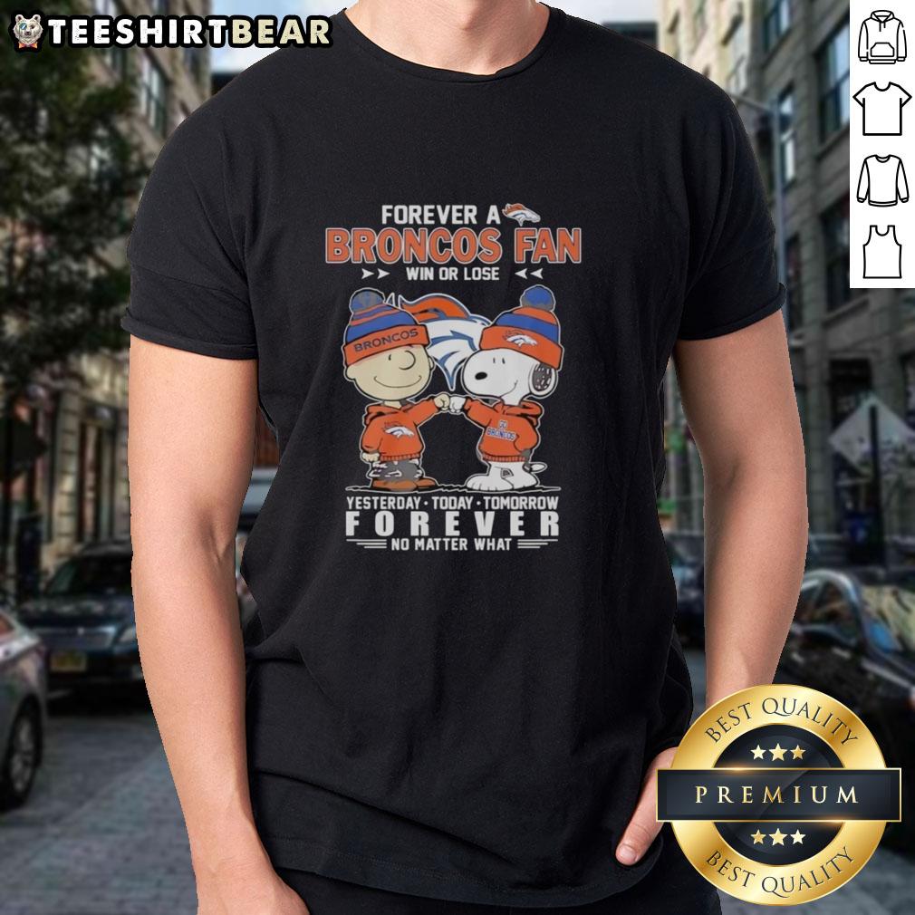 top-charlie-brown-fist-bump-snoopy-forever-a-denver-broncos-fan-win-or-lose-no-matter-what-t-shirt Alt Text: Charlie Brown fist bump with Snoopy on a Denver Broncos fan t-shirt celebrating loyalty win or lose.