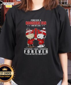 Top Charlie Brown fist bump with Snoopy, celebrating Indiana Hoosiers fandom in a stylish ladies tee.