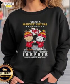 Charlie Brown and Snoopy fist bump in Kansas City Chiefs sweatshirt, celebrating loyalty win or lose.