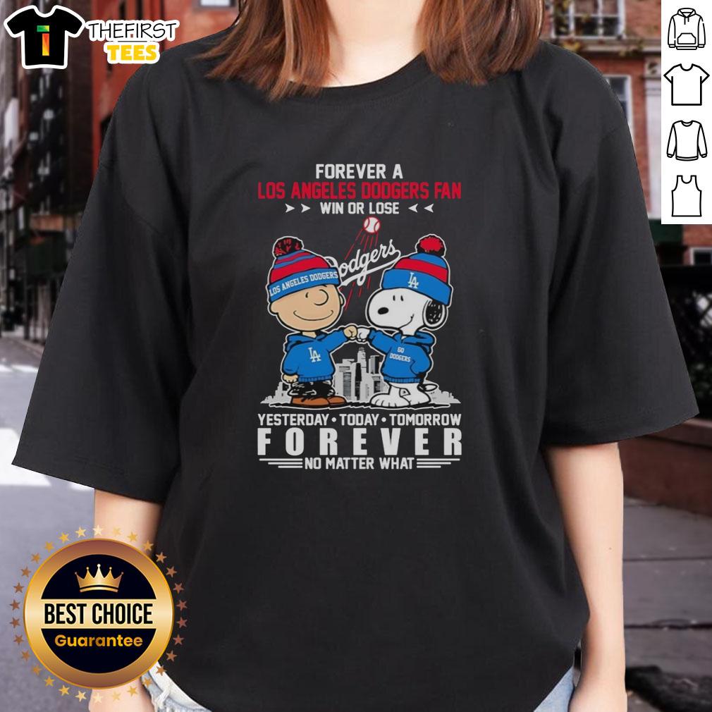 top-charlie-brown-fist-bump-snoopy-forever-a-los-angeles-dodgers-fan-win-or-lose-no-matter-what-ladies-tee Alt Text: Top Charlie Brown fist bump with Snoopy, celebrating Dodgers fandom in a ladies tee, win or lose, forever loyal.