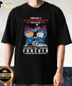 Top Charlie Brown fist bump with Snoopy on a Dodgers fan T-shirt, celebrating loyalty win or lose.