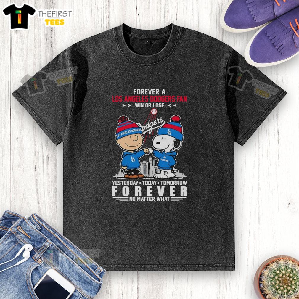 top-charlie-brown-fist-bump-snoopy-forever-a-los-angeles-dodgers-fan-win-or-lose-no-matter-what-washed-t-shirt Charlie Brown and Snoopy fist bump in a 'Forever a Dodgers Fan' t-shirt, showcasing loyalty win or lose.