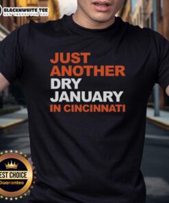Alt Text: Top Cincinnati Bengals Football t-shirt featuring 'Just Another Dry January in Cincinnati' slogan for fans.