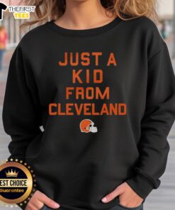 Top Cleveland Browns Just A Kid From Cleveland sweatshirt featuring team colors and logo, perfect for fans.