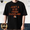Alt Text: Top Cleveland Browns Just A Kid From Cleveland T-Shirt featuring bold graphics and the team's iconic colors.