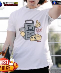 Alt Text: Top D.J. Moore Cheese Grater T-Shirt featuring a playful design perfect for fans and casual wear.