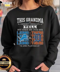 Grandma wearing a Detroit Lions and Tigers sweatshirt, smiling and excited, showcasing her team spirit.