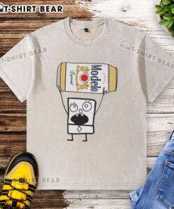 Alt Text: Doodlebob holding a Modelo Especial beer can while wearing a washed t-shirt, showcasing a fun and quirky character.