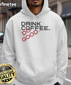 Cozy Top Drink Coffee Do Good Hoodie displayed on a wooden table, perfect for coffee lovers and casual wear.