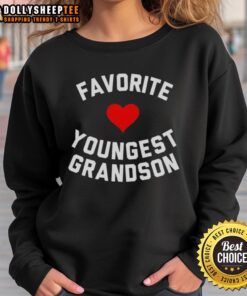 Youngest grandson wearing a cozy 'Top Favorite' sweatshirt, showcasing love and warmth in family moments.