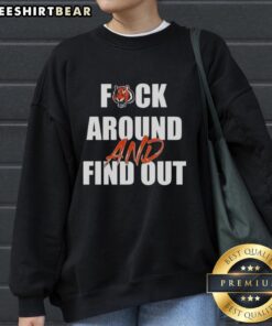Top Fck Around And Find Out Cincinnati Bengals sweatshirt featuring team colors and logo, perfect for fans and game day wear.