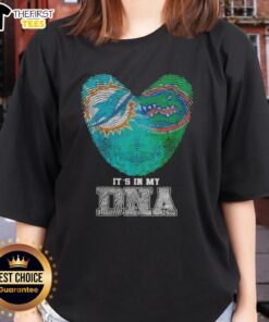 Miami Dolphins and Florida Gators women's tee featuring 'It's In My DNA' and top fingerprints design.