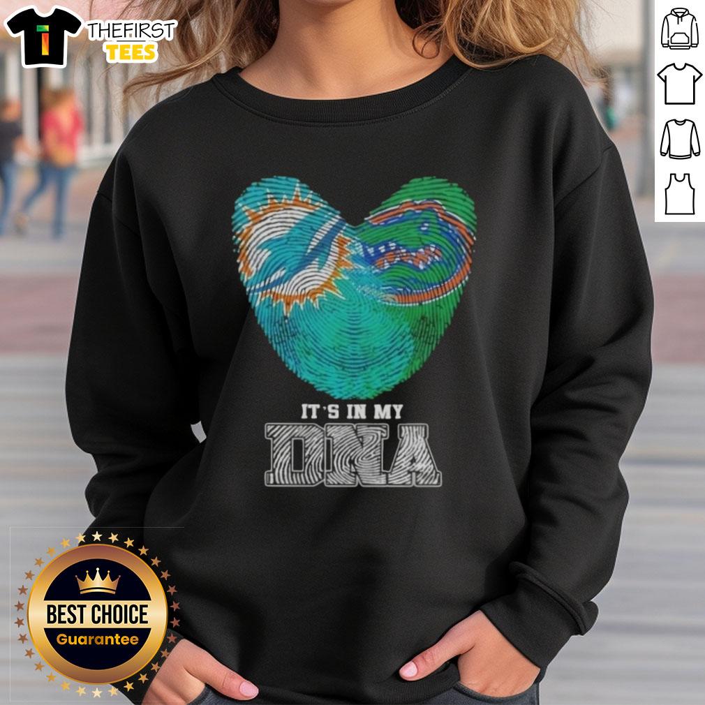 top-fingerprints-miami-dolphins-x-florida-gators-its-in-my-dna-sweatshirt Miami Dolphins and Florida Gators sweatshirt featuring 'It's In My DNA' design, perfect for sports fans and alumni.