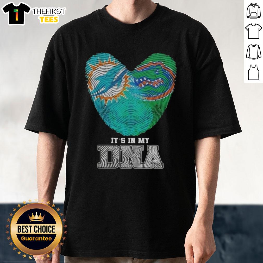 top-fingerprints-miami-dolphins-x-florida-gators-its-in-my-dna-t-shirt-1 Alt Text: Top Fingerprints Miami Dolphins X Florida Gators It's In My DNA T-Shirt featuring team logos and vibrant graphics.