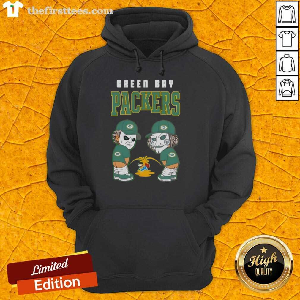 top-green-bay-packers-x-michael-myers-and-billy-the-puppet-piss-on-hoodie Top Green Bay Packers X Michael Myers and Billy the Puppet hoodie design featuring a unique graphic blend of horror and sports.