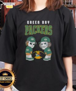 Alt Text: Green Bay Packers X Michael Myers and Billy the Puppet graphic on a ladies tee, perfect for fans and horror lovers.