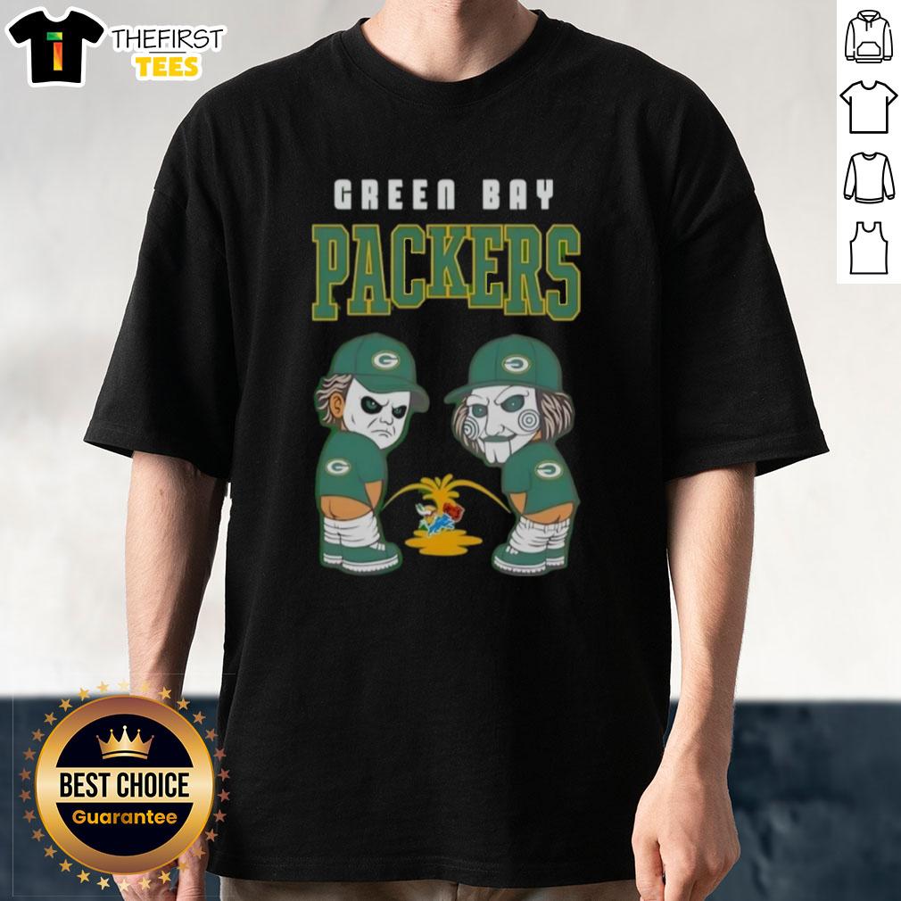 top-green-bay-packers-x-michael-myers-and-billy-the-puppet-piss-on-t-shirt-1 Alt Text: Top Green Bay Packers X Michael Myers and Billy The Puppet graphic t-shirt featuring iconic horror elements.