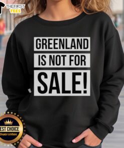 Top Greenland Is Not For Sale Sweatshirt featuring bold text on a cozy green background, perfect for eco-conscious fashion.
