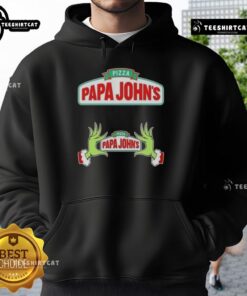 Top Grinch hands holding a pizza in a Merry Christmas hoodie from Papa John's, perfect for festive holiday cheer.