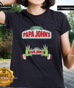 Top Grinch hands holding a pizza with a festive 'Merry Christmas' design on a Papa John's ladies tee shirt.
