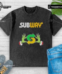 Top Grinch hands holding a subway sandwich on a Merry Christmas washed t-shirt, perfect for festive holiday style.