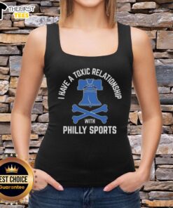 Woman wearing a 'Toxic Relationship with Philly Sports' baseball tank top, showcasing her love for Philadelphia sports culture.
