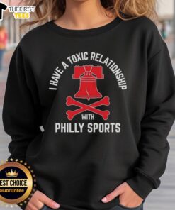 Cozy sweatshirt featuring 'I Have A Toxic Relationship With Philly Sports' design, perfect for basketball fans.